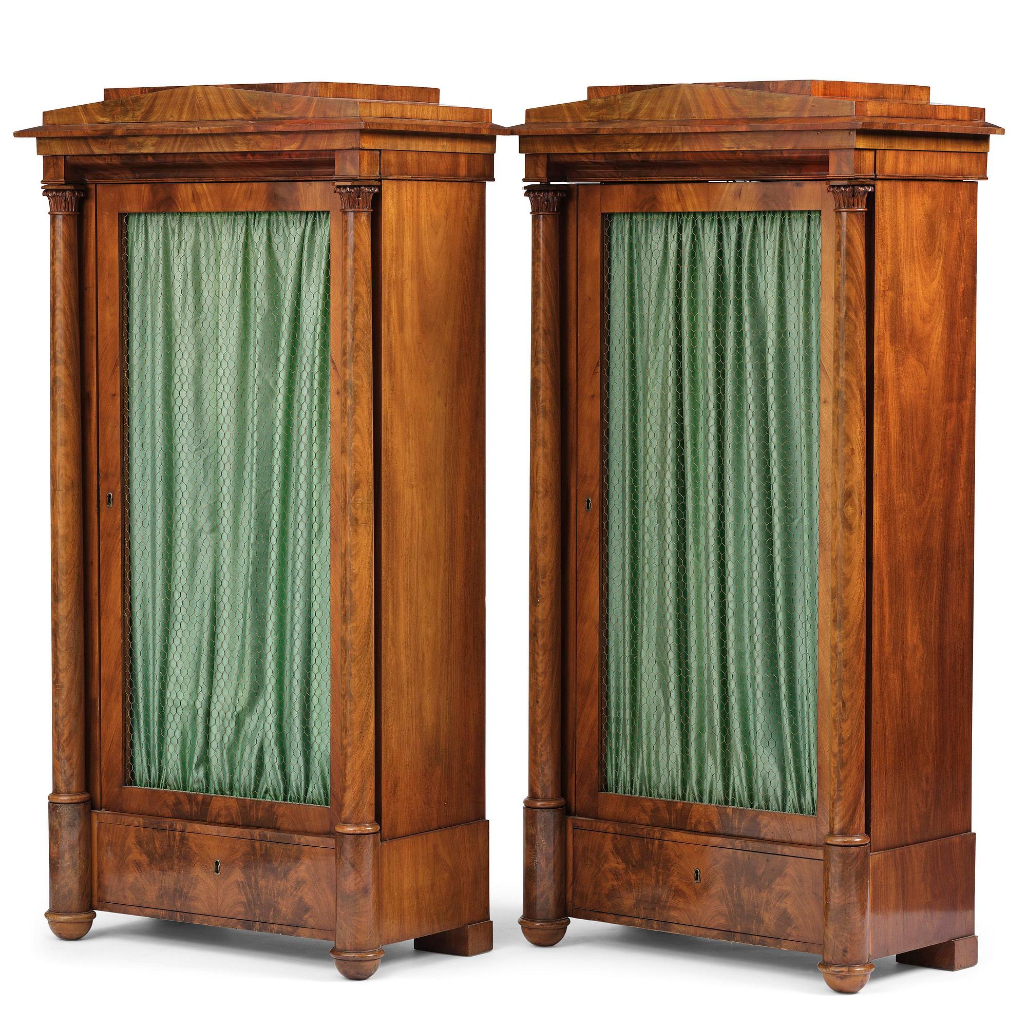A pair of Swedish Empire mahogany bibliothèques, Stockholm, early 18th century.