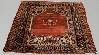 Matto, an antique silk Heriz, ca 166,5-170 cm x 116-120 cm.