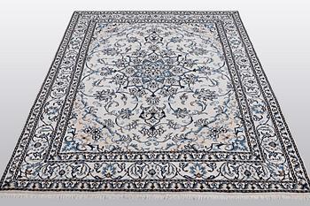 A rug, Nain, part silk, so called 9 LAA, ca 233 x 164 cm.