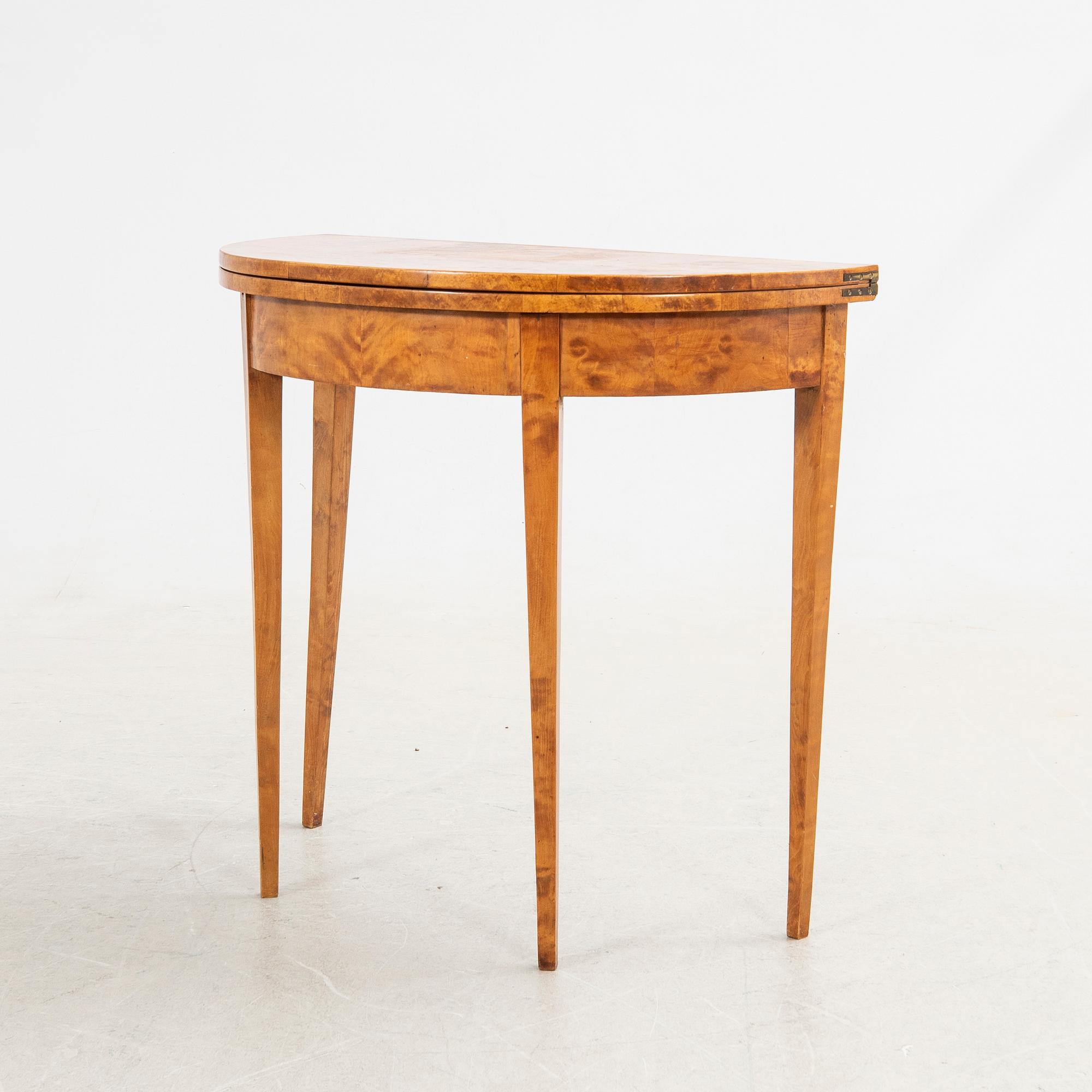 Half-moon table, 19th century.