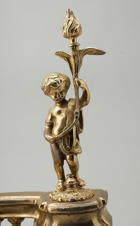 ELDHUNDAR, 1 par, förgylld metall, England, 1900-/2000-tal.