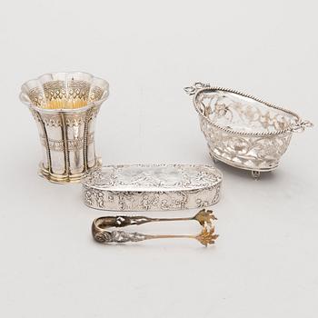 Four silver objects from the 20th Century.