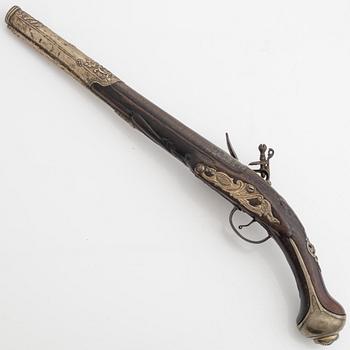 A 18th Century flintlock pistol.