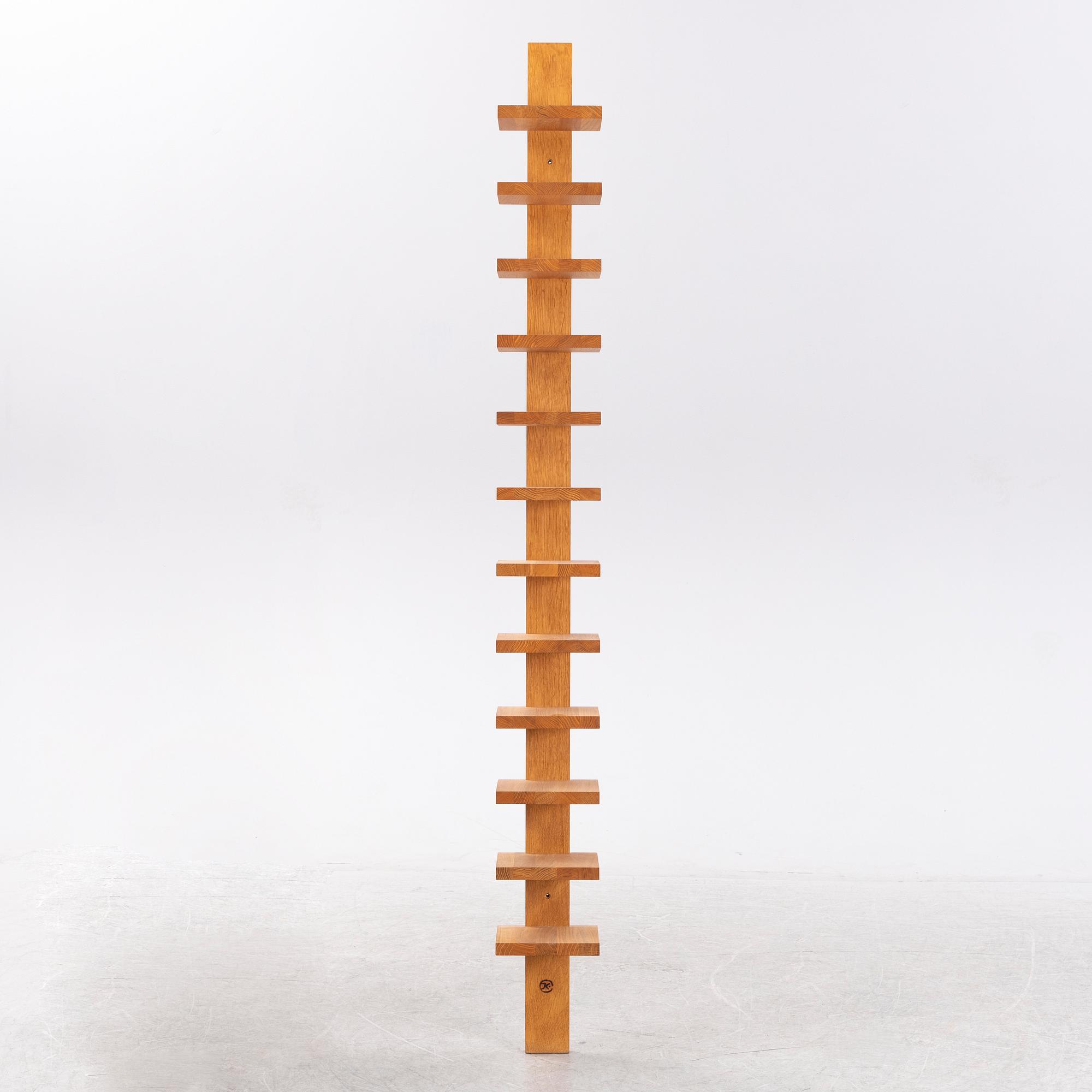 A 'Pilaster' shelf by John Kandell for Källemo, designed 1989.