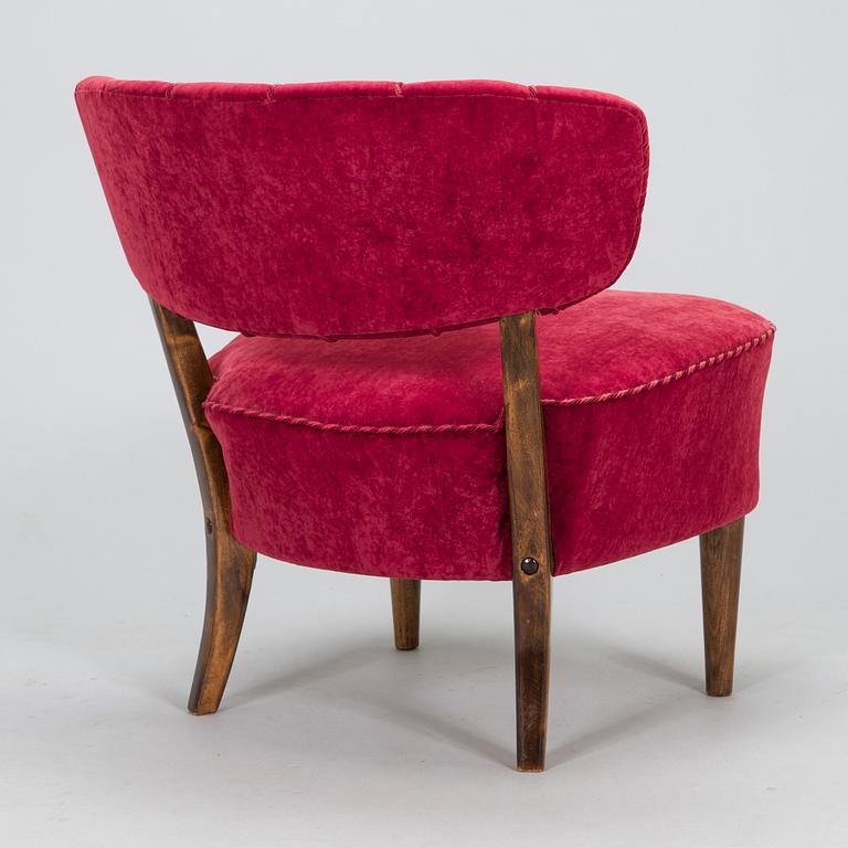 Lisa Johansson-Pape, a 1940s armchair for Oy Stockmann Ab, Keravan puusepäntehdas.