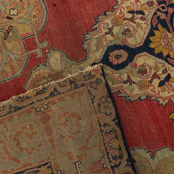 An antique second part of the 19th century Persian carpet ca 182 x112 cm.
