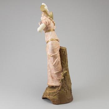 ERNST WAHLISS, a early 20th century porcelain figurine, Turn Wien Austria.