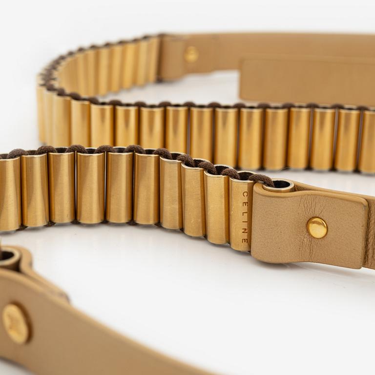 Céline, a gulden leather and metal belt, size 70.