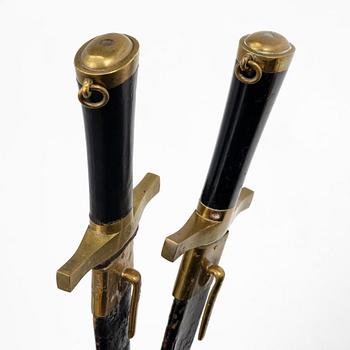 Two Swedish cutlasses 1856 pattern, with scabbards.