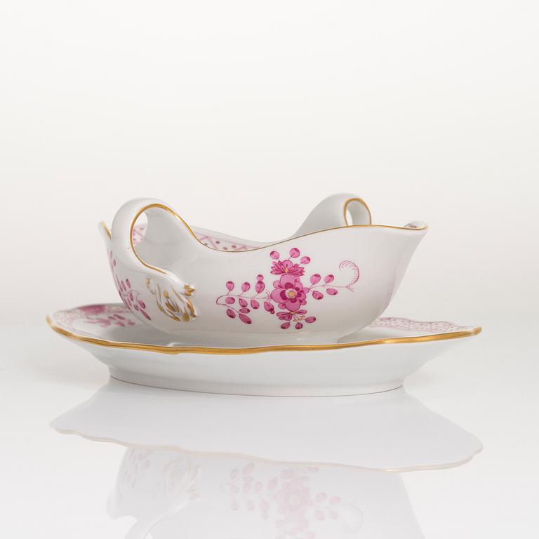 A 77-piece set of Meissen 'Indische malerei' porcelain tableware from the latter half of the 20th century.