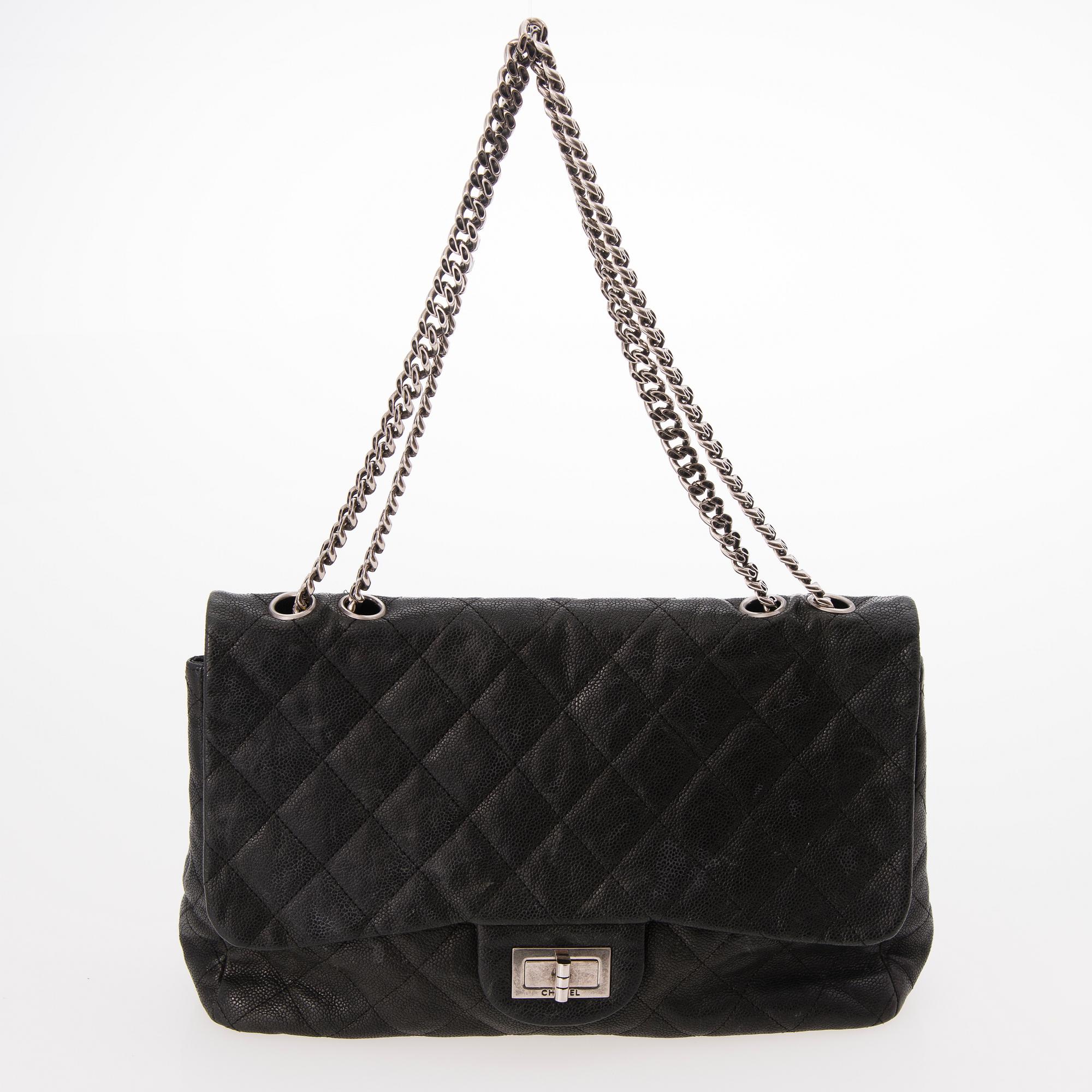 CHANEL Caviar Reissue 2.55 Jumbo Single Flap Bag.