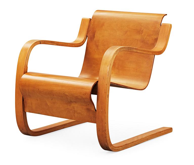 An Alvar Aalto birch armchair, 'Nr 31' by  O.y Huonekalu-ja Rakennustyötehdas A.B, Finland, probably 1940's.