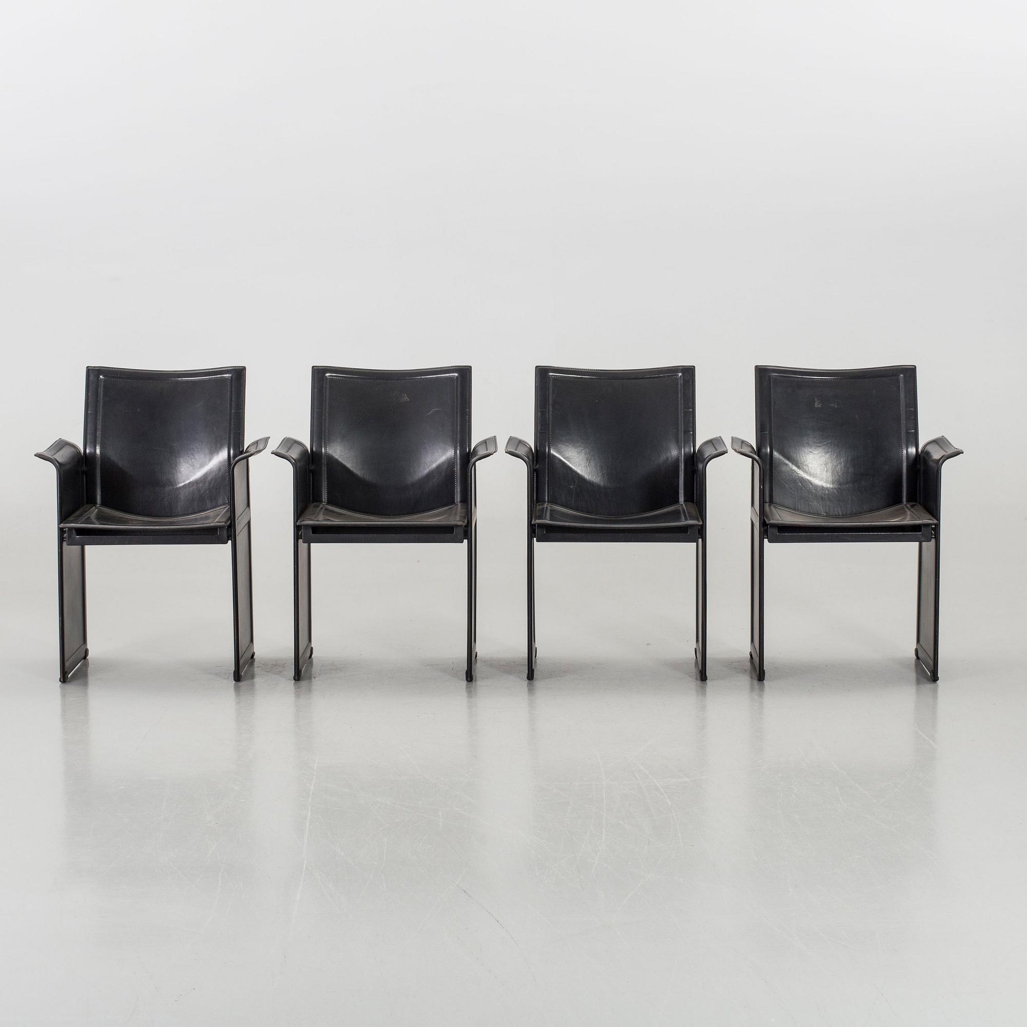 FOUR CHAIRS "KORIUM" TITO AGNOLI FOR MATTEO GRASSI.