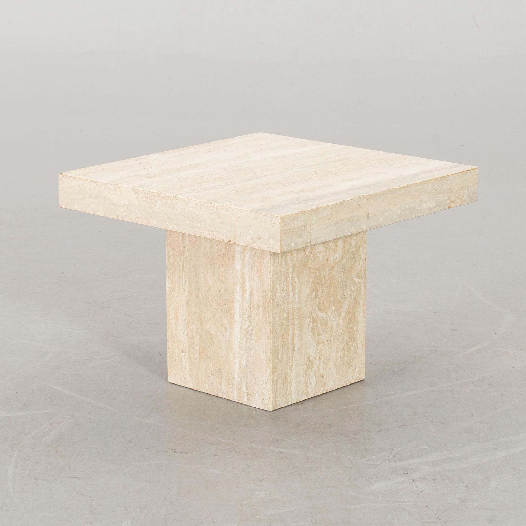 A SMALL TRAVERTINE TABLE.