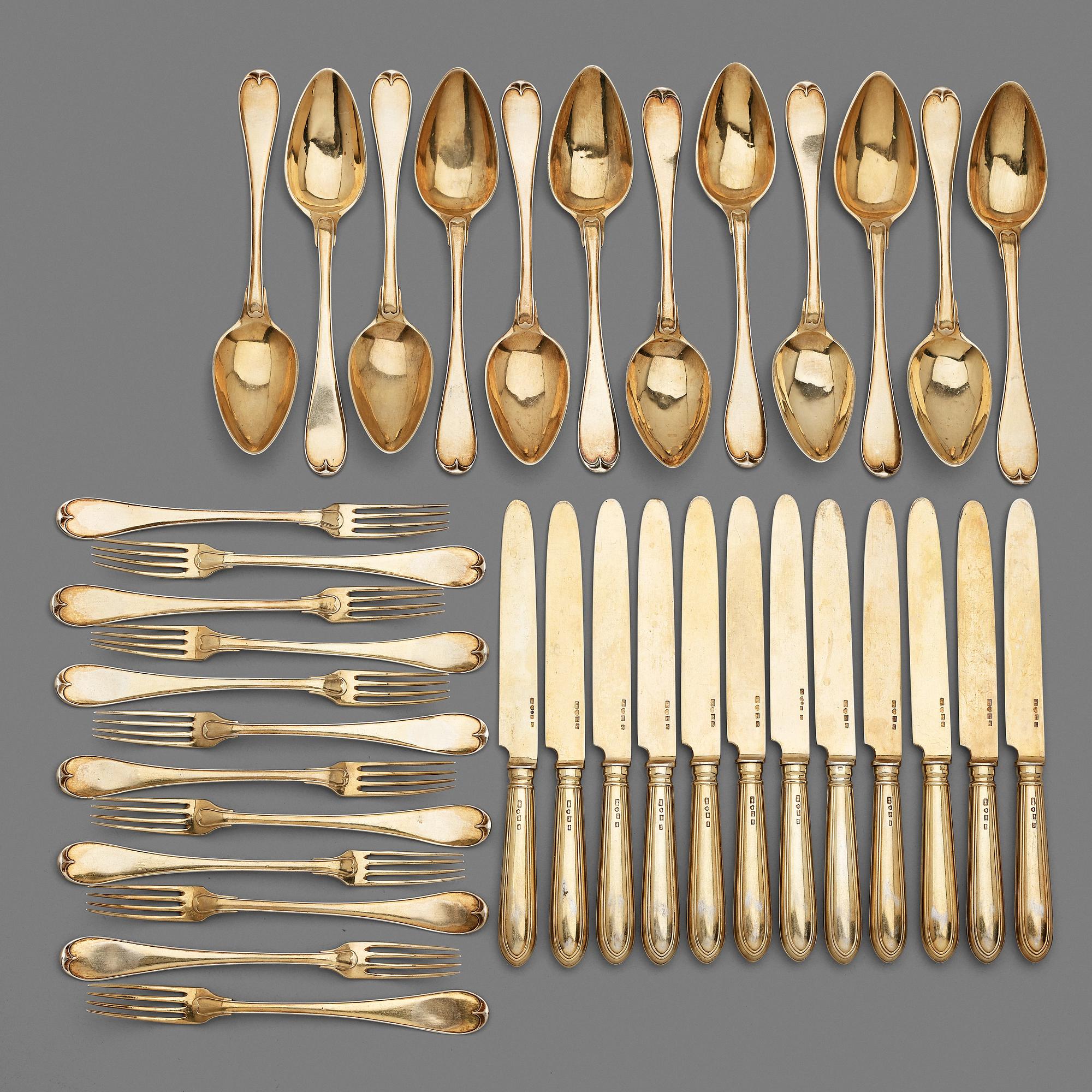 A Swedish 19th / 20th century 36 piece silver-gilt dessert-cutlery, mark of JP Gonvall, Stockholm 1818-1821 and.