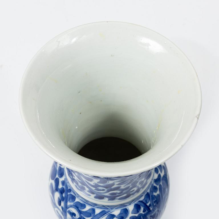 Two blue and white vases, Qing dynasty, 19th century and a blue and white vase with cover, 18th century.