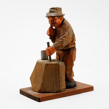 A signed wooden sculpture by CARL OLOF TRYGG.