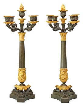 A pair of French Empire 19th century five-light candelabra.