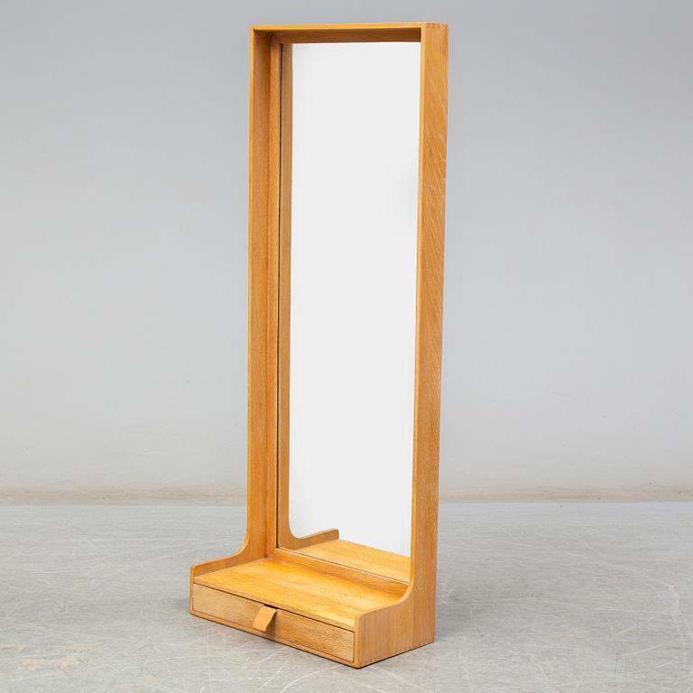 An oak framed mirror with drawer, 1960's.