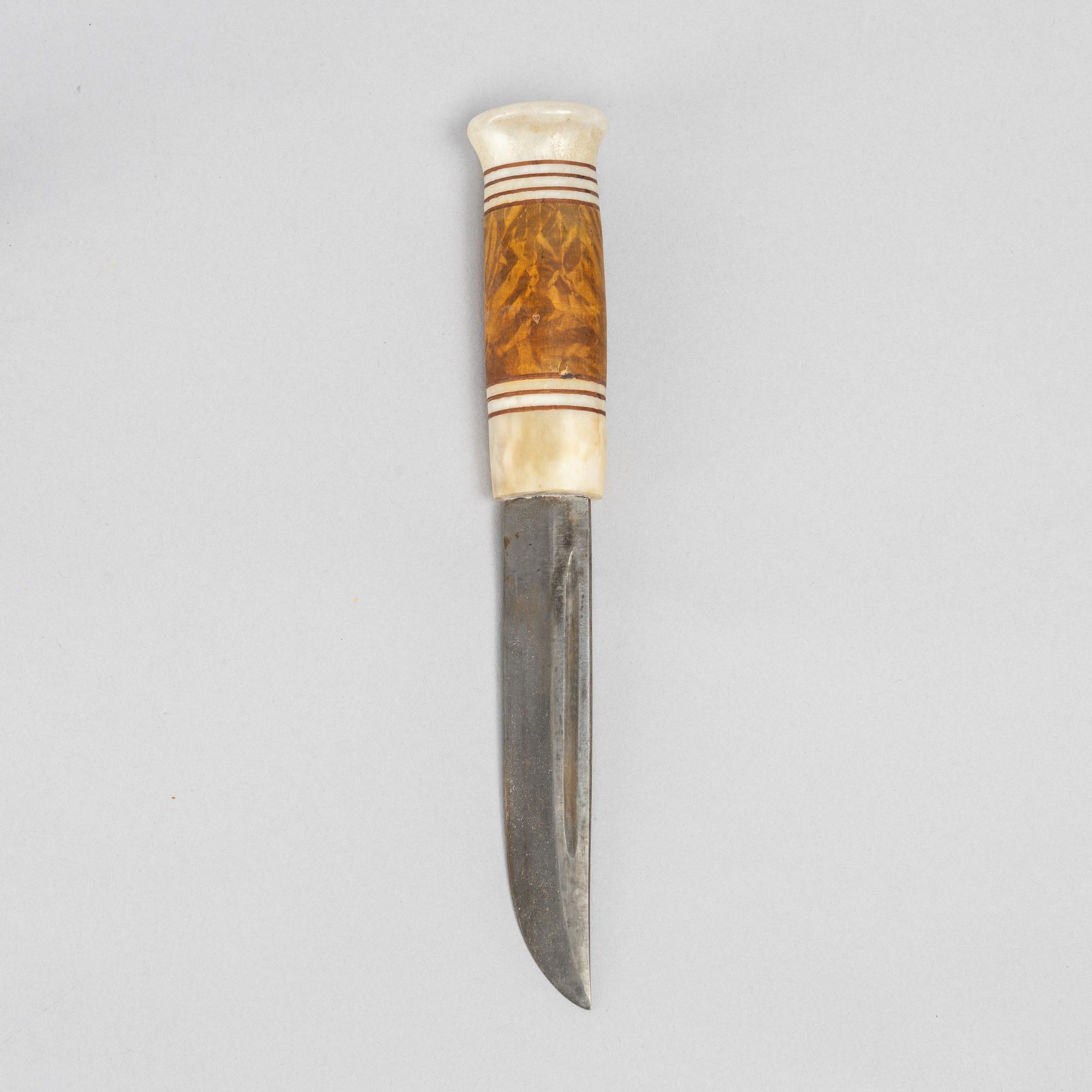 Ingvar Svonni, a reindeer antler knife, signed.