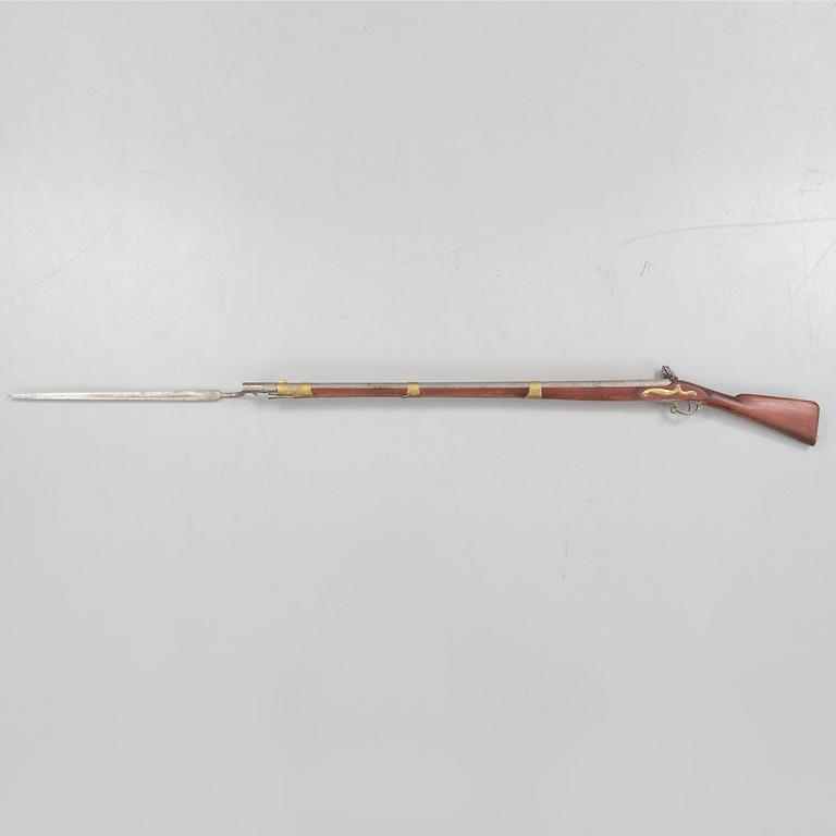 A flintlock rifle with bayonet early 19th century.