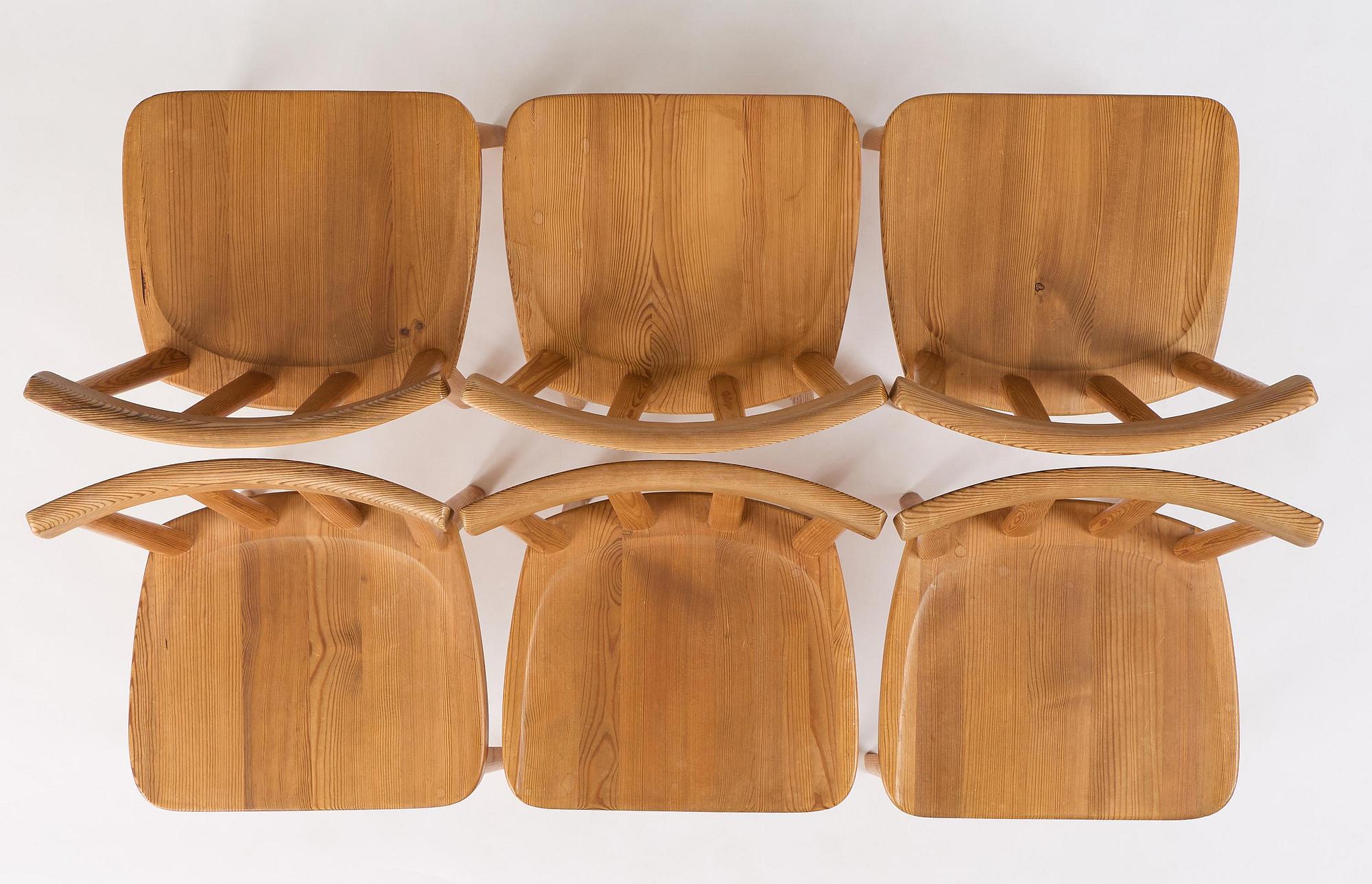 Axel Einar Hjorth, a set of six stained pine "Utö" chairs, Nordiska Kompaniet, Sweden, 1930s.