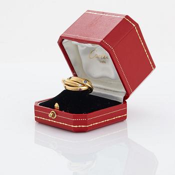 Cartier ring "Trinity" 18K guld med runda briljantslipade diamanter, rubiner och safirer.