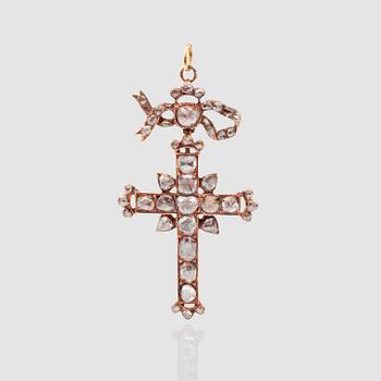 1227. An antique-cut diamond pendant in the shape of a cross.