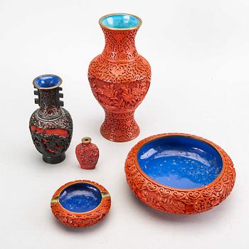 A set fo five Chinese lacquer vases and bowls first half of the 20th century.