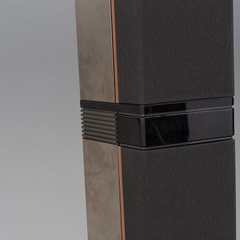 A pair of Bang & Olufsen speakers.