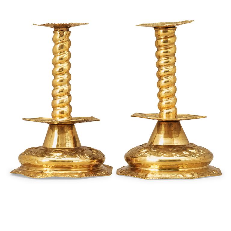 A pair of Swedish Baroque 18th century brass candlesticks.