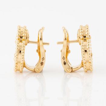 A Van Cleef & Arpels a pair of earrings "Alhambra" 18K gold and Mother-of-pearl.