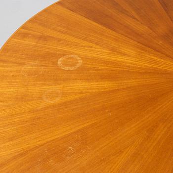 A mahogany veneered Swedish Modern dining table, 1950's.