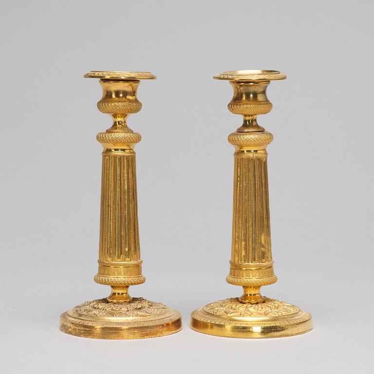 A pair of Empire-style candlesticks, ca 1900.