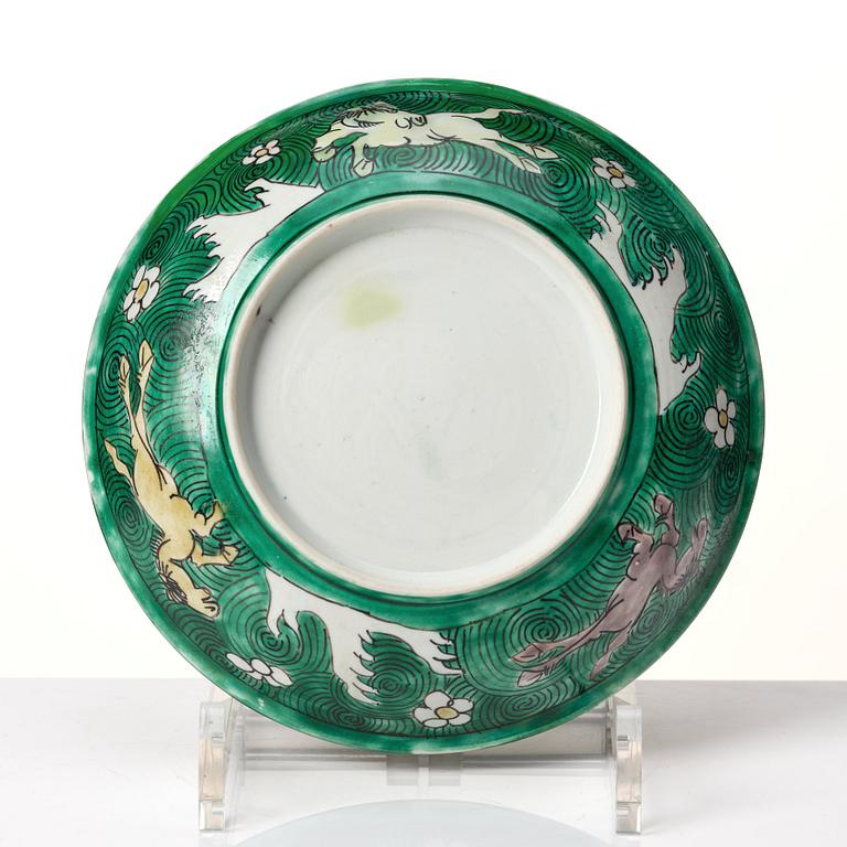 A green yellow and aubergine glazed dish with flying horses, Qing dynasty, Kangxi (1662-1722).