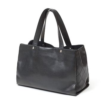 A black leather handbag by Chanel.