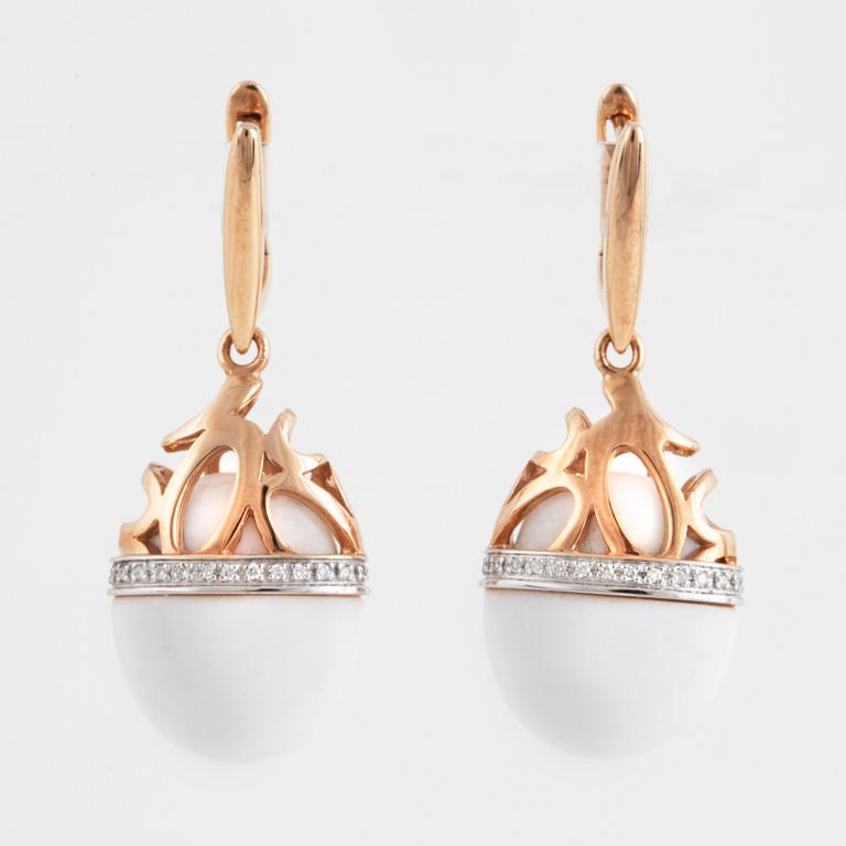 A pair of brilliant cut diamond and white agate earrings.