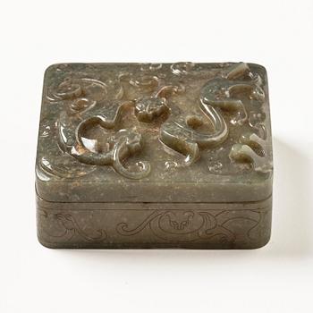 A well carved green stone box with cover, China, 20th century.