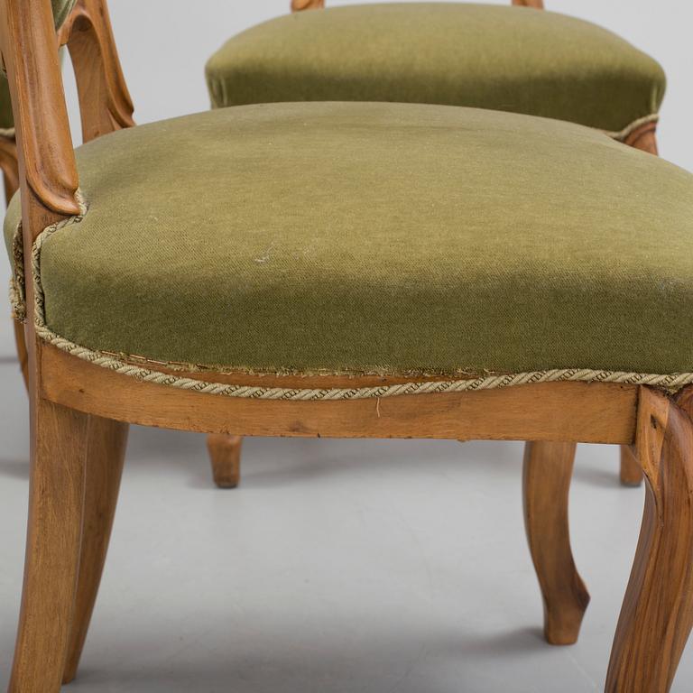 A set of seven late 1800s chairs.