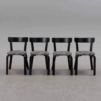 a dining table '81B' and four '69' chairs by Alvar Aalto, Artek.