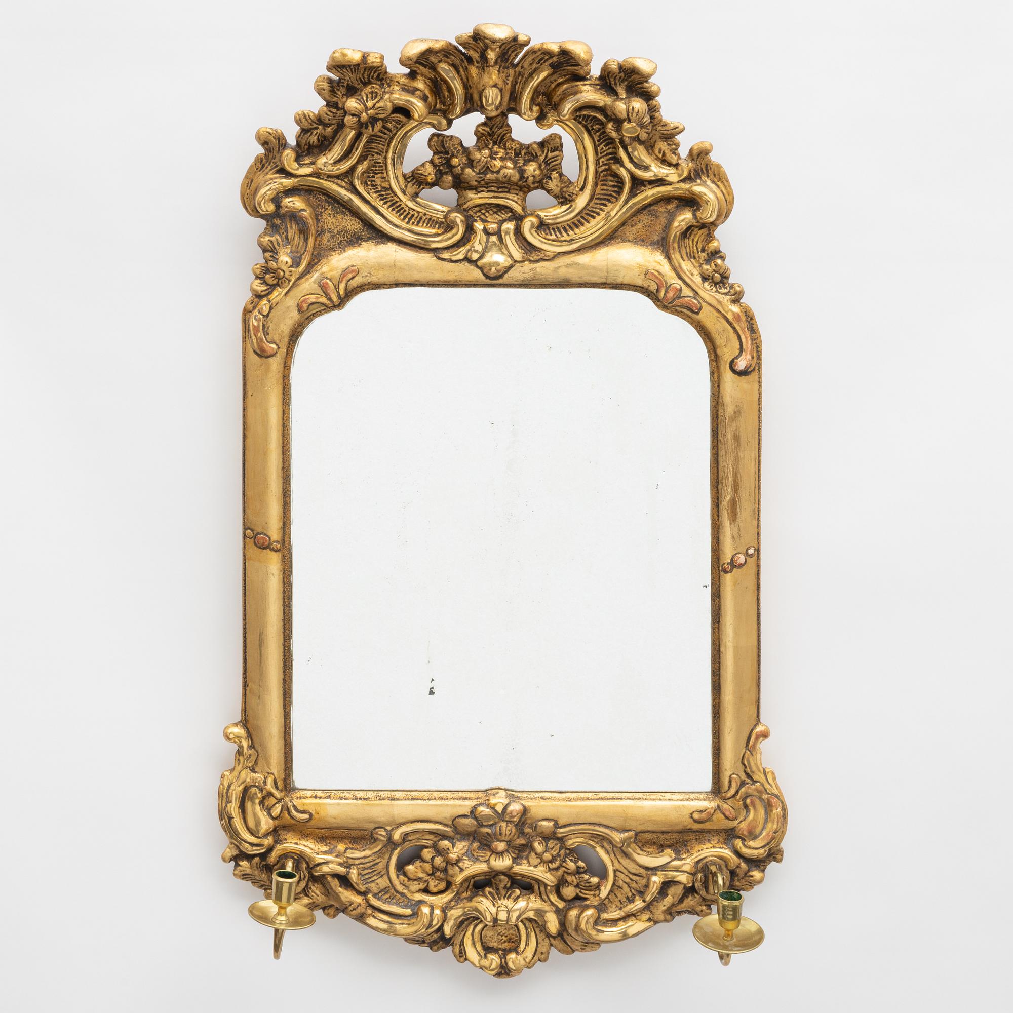 A Swedish rococo two-branch girandole mirror, Stockholm, later part 18th century.