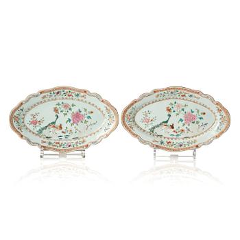 1025. A pair of famille rose 'double peacock' dishes, Qing dynasty, Qianlong (1736-95).