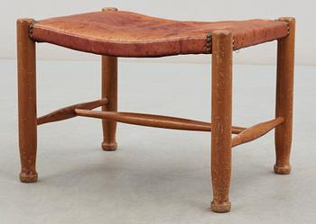 A Josef Frank mahogany and red leather stool, Svenskt Tenn, model 686.