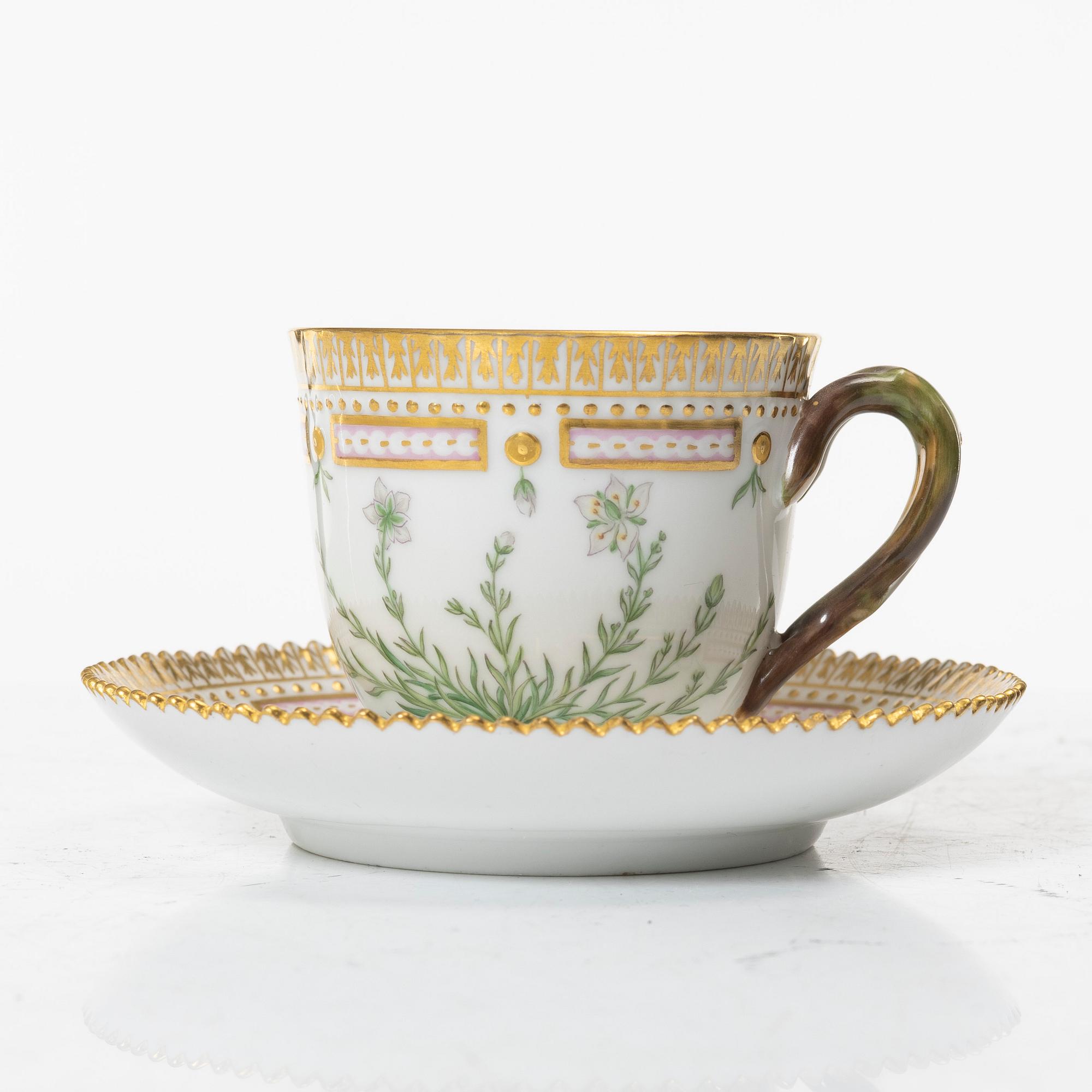 A Royal Copenhagen 'Flora Danica' coffee cup with stand, Denmark, 20th Century.