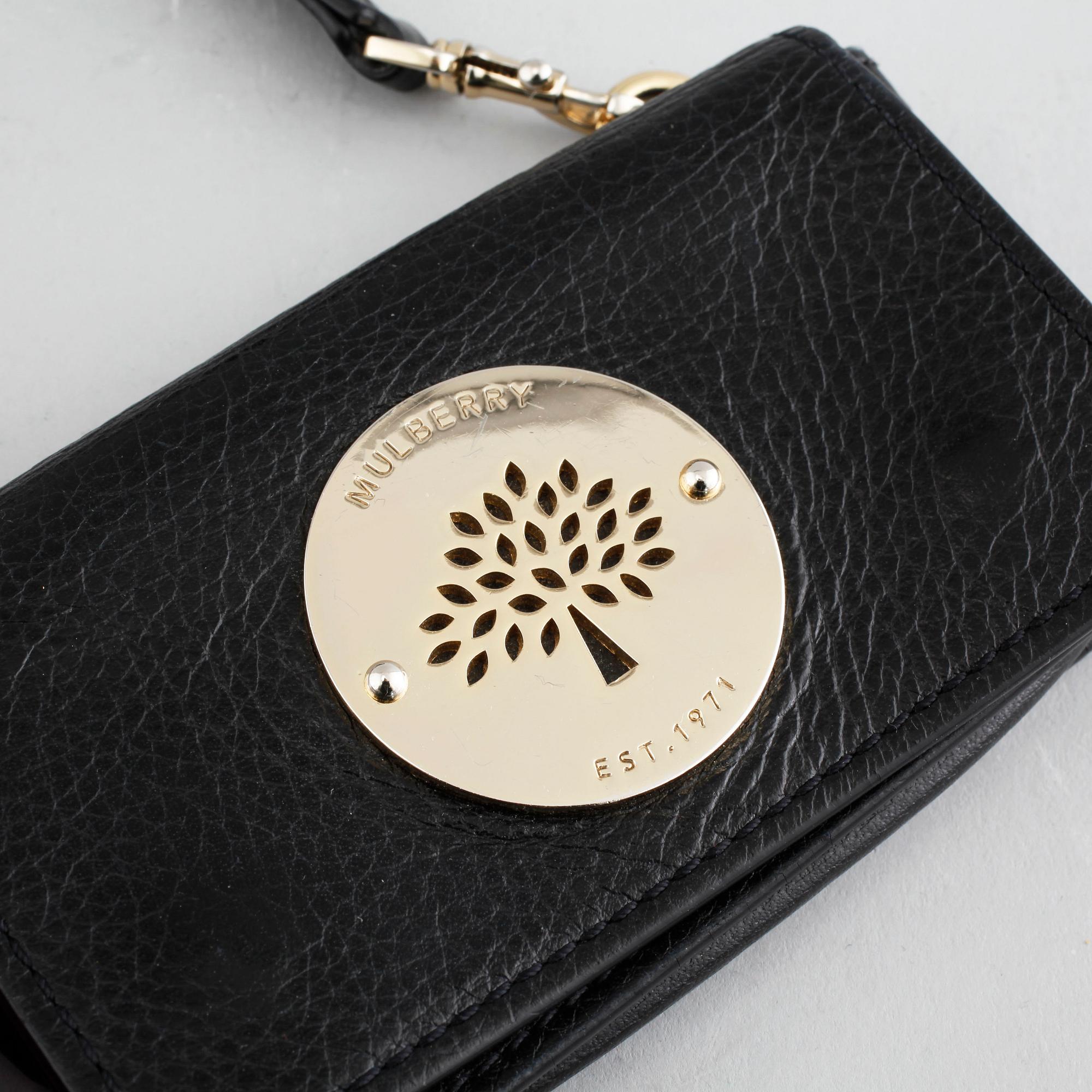 Two mobile cases named "Daria Mini Messenger" and a keyring from Mulberry.