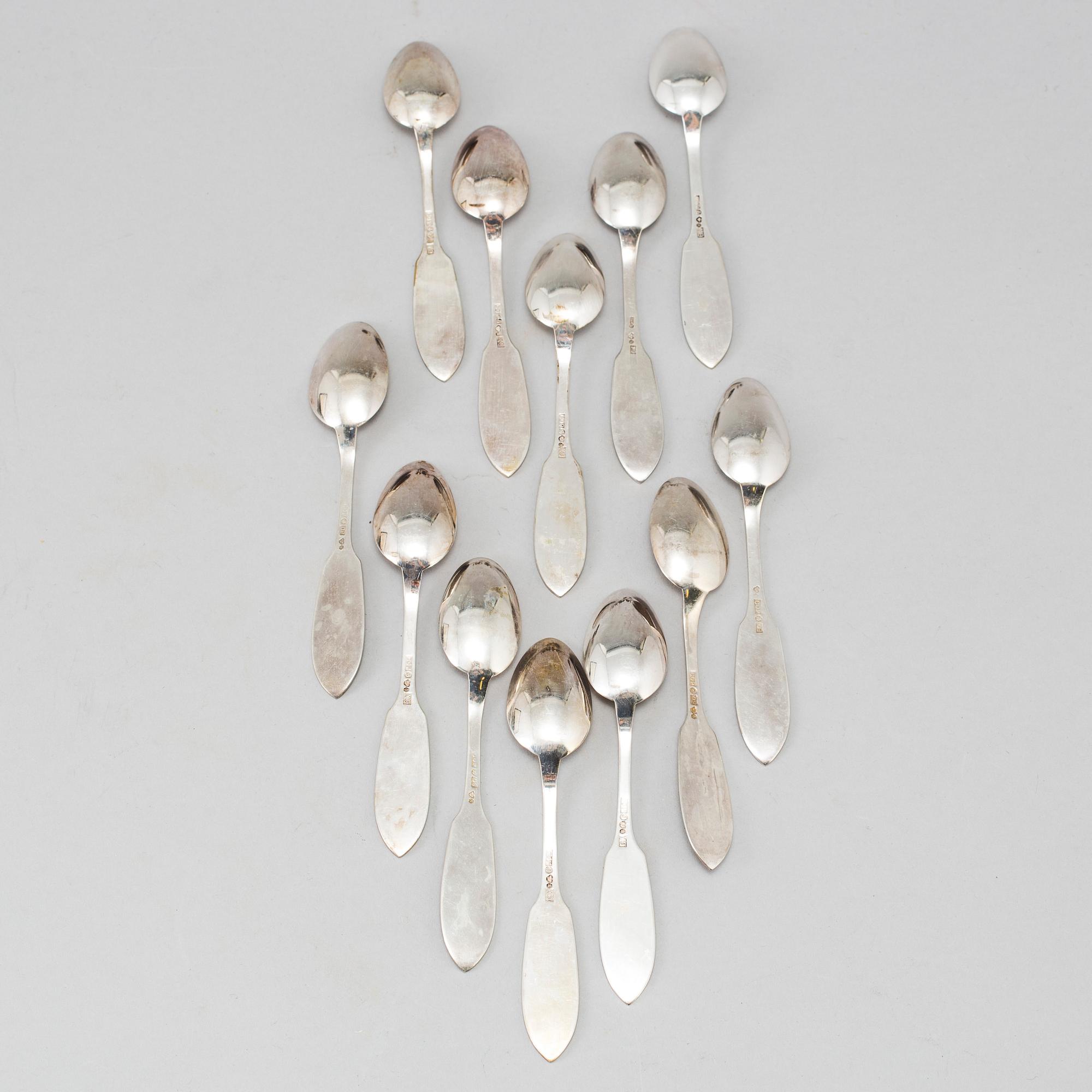 a lot of 24 silver spoons by C O Persson AB in Haparanda, Sweden. Weight ca 522 grams.