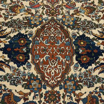 A semi-antique carpet from Esfahan, around 216 x139 cm.