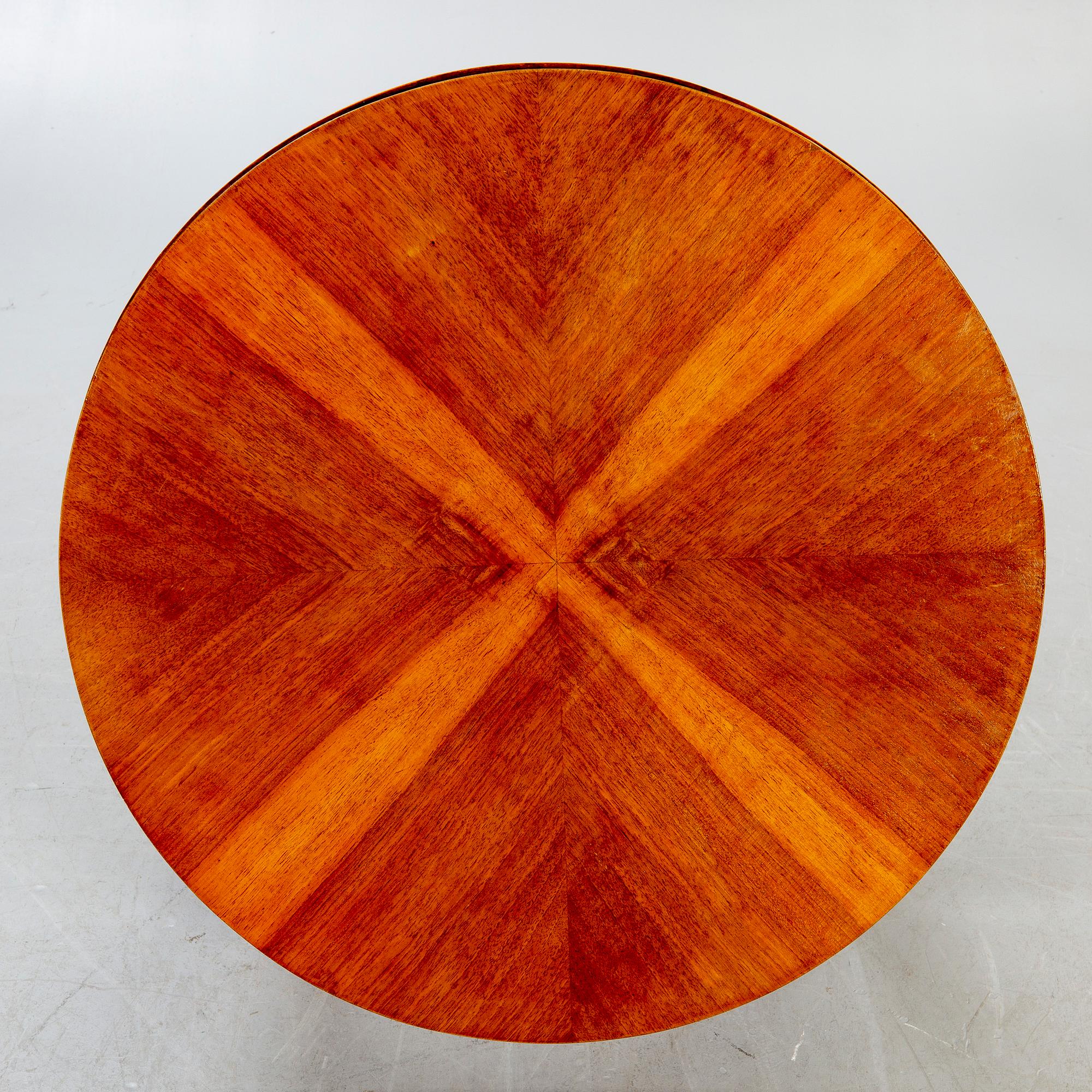 An Art deco style walnut coffee table alter part of the 19th century.