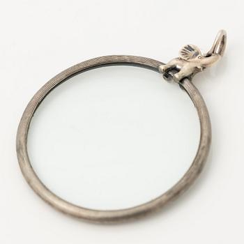 Ole Lynggaard, Magnifying glass, silver with a brilliant-cut diamond, decorated with an elephant motif.
