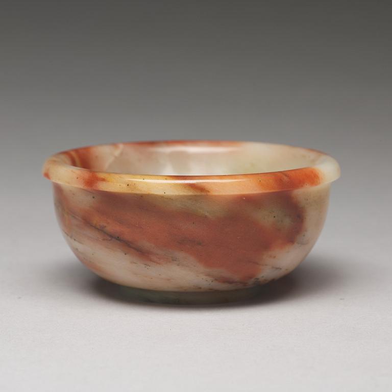 A sculptured stone bowl, China, early 20th Century.